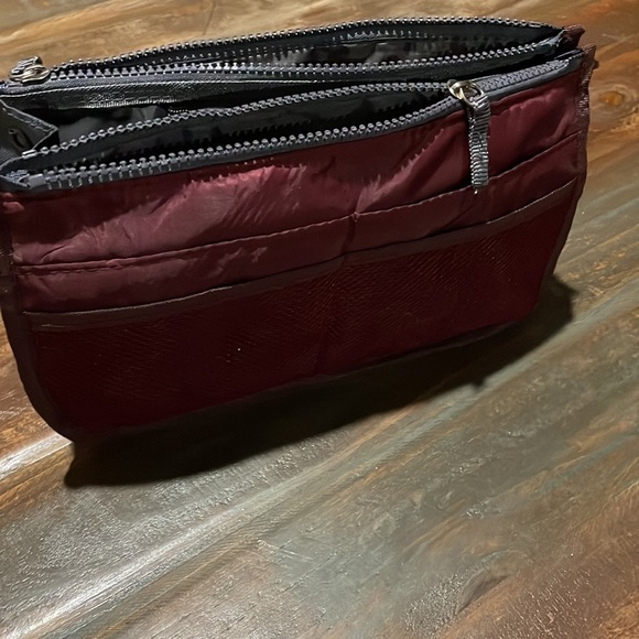 Travel maroon toiletry bag. 10” long by 6” tall. - Picture 7 of 9